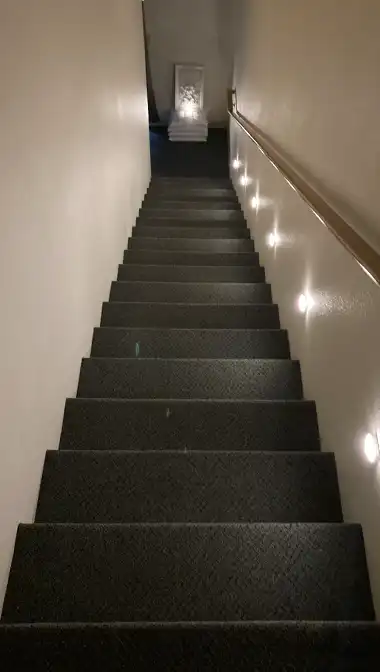 Our lit staircase connecting our spa and salt cave.